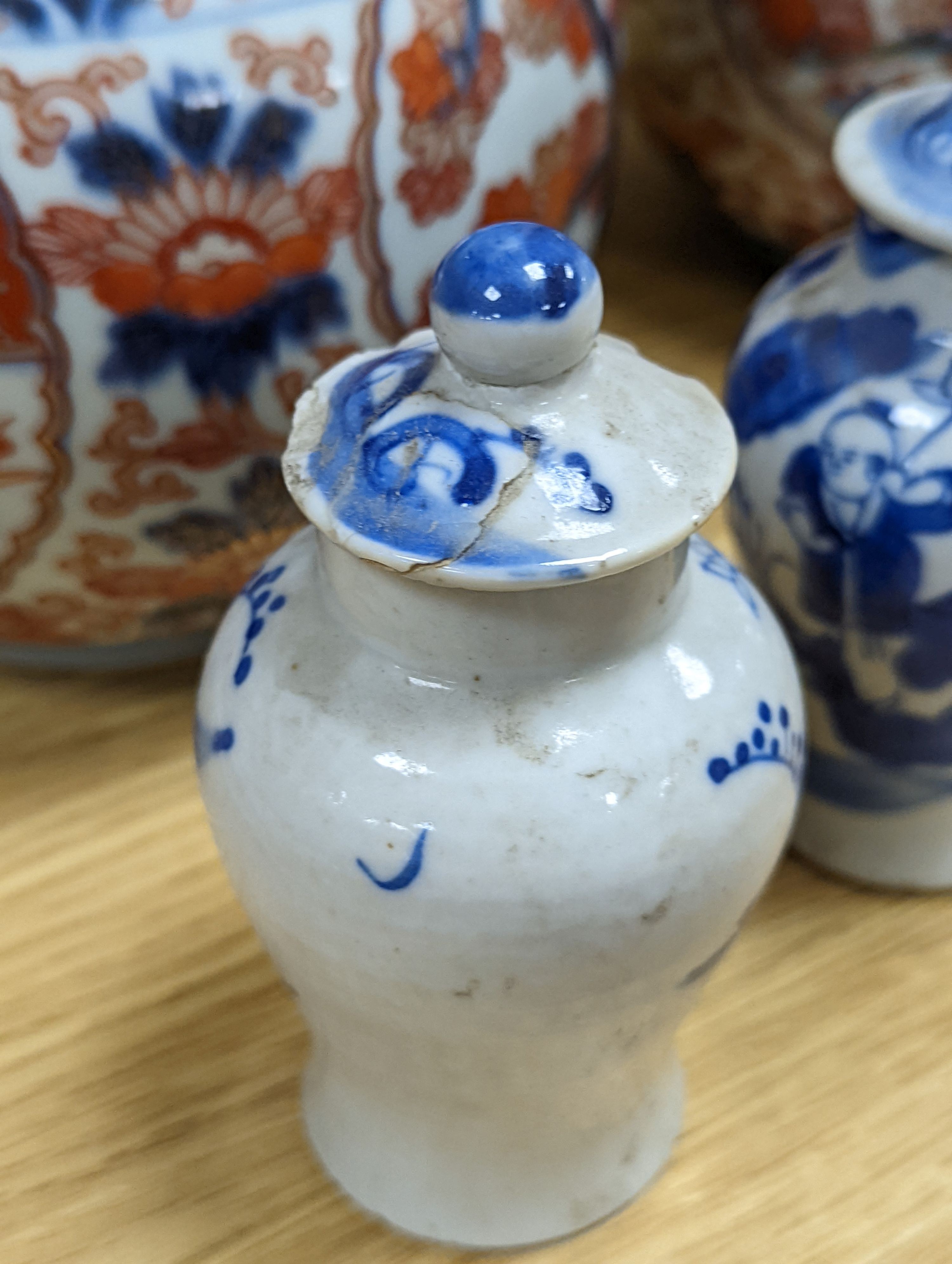 An 18th century Chinese famille rose dish, crackle-glaze stem cup, Beijing glass tea bowl and a Chinese Imari plate. Largest 24cm